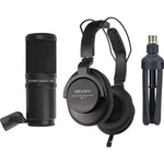 Zoom microphone, headphones, and tripod on a white background