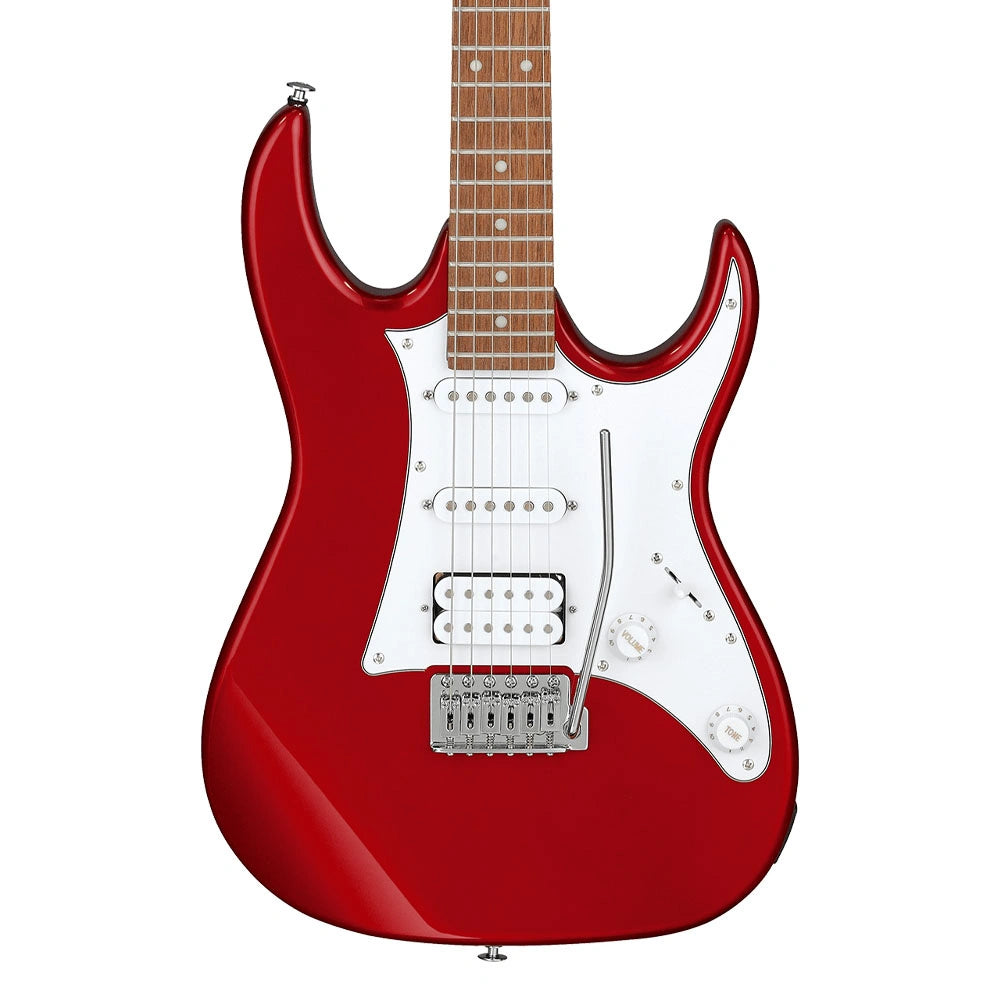 Red electric guitar with a white pickguard on a white background