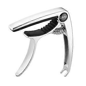 Metallic guitar capo with 'Capo' branding on a white background