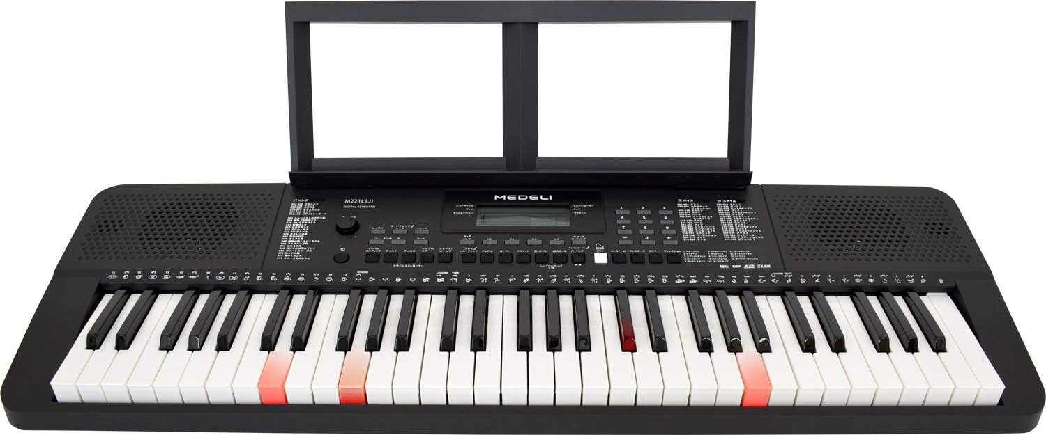 A digital keyboard with a black body and white keys, featuring various control buttons and a screen.