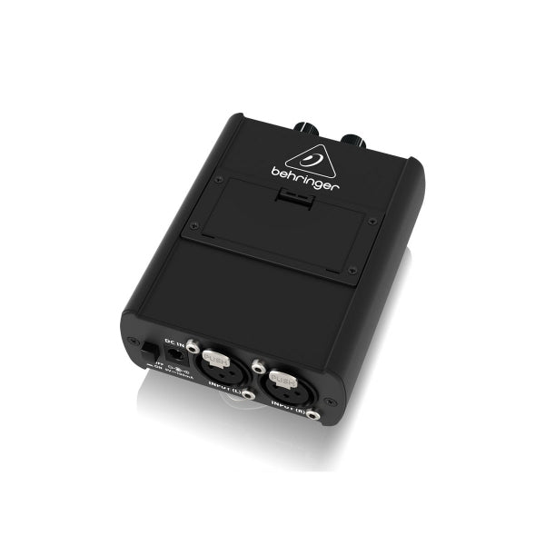 Black audio interface with Behringer logo on a white background
