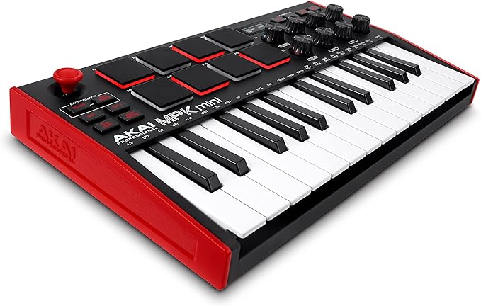 Mini keyboard with red border and black and white keys on a white background