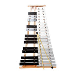 A 32 key xylophone with aluminum bars and wooden frame, accompanied by a pair of mallets, one with a soft end and the other with a hard end. The instrument is displayed alongside a hardcase.