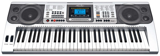 Keyboard with speakers and display on a white background
