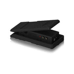 Black foot pedal with textured surface on a white background