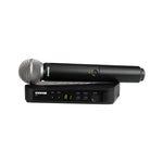 Shure BLX24UK/SM58-H8E Wireless Handheld Microphone System, including a black SM58 handheld microphone and a black BLX4 receiver with digital display.