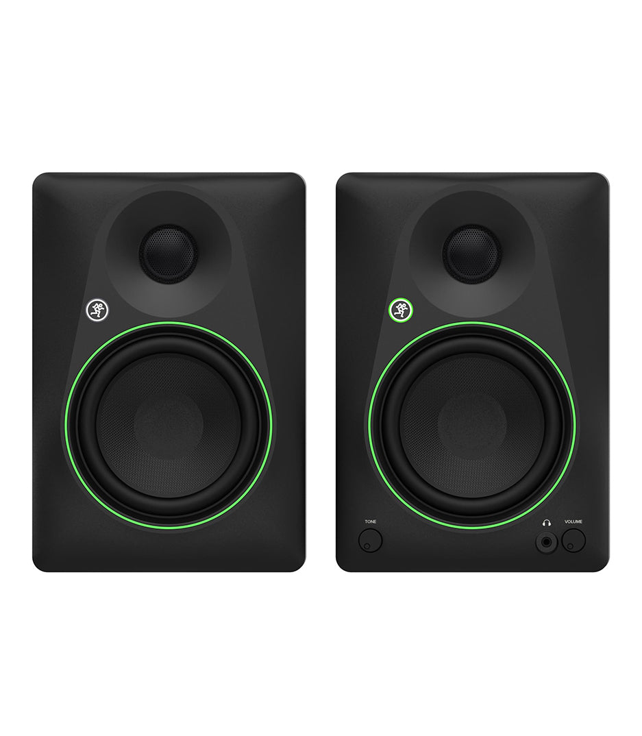 Pair of black studio monitors with green accents on a white background
