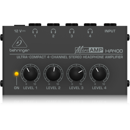 Behringer MicroAMP HA400 4-channel stereo headphone amplifier with knobs for level control and input/output connections.