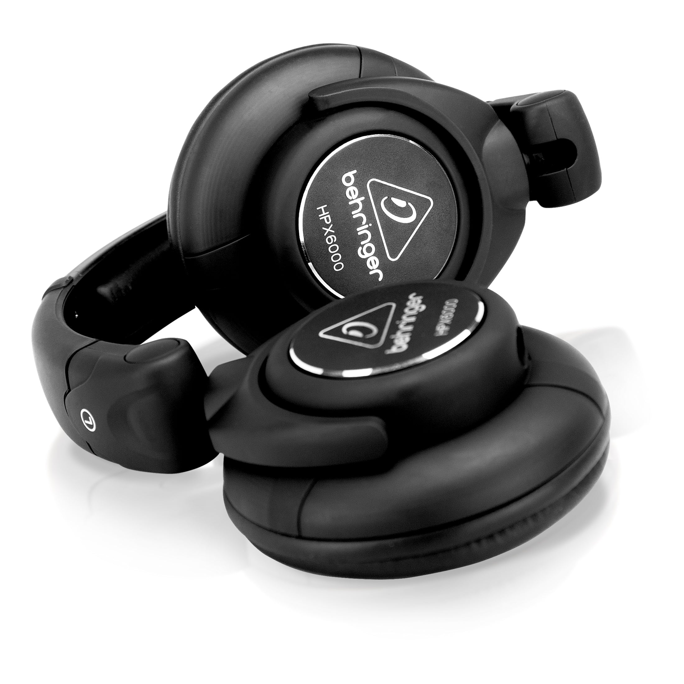 Black headphones with Behringer logo on a white background