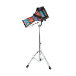 Colorful drum set on a stand against a white background