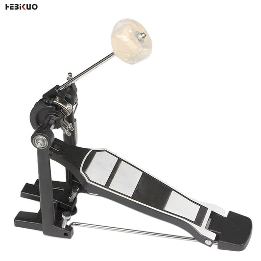 Drum pedal with a white ball on a white background