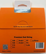 Orange product packaging for 'Premium Oud String' with a white hanging tab, featuring text details and barcode on a white background.