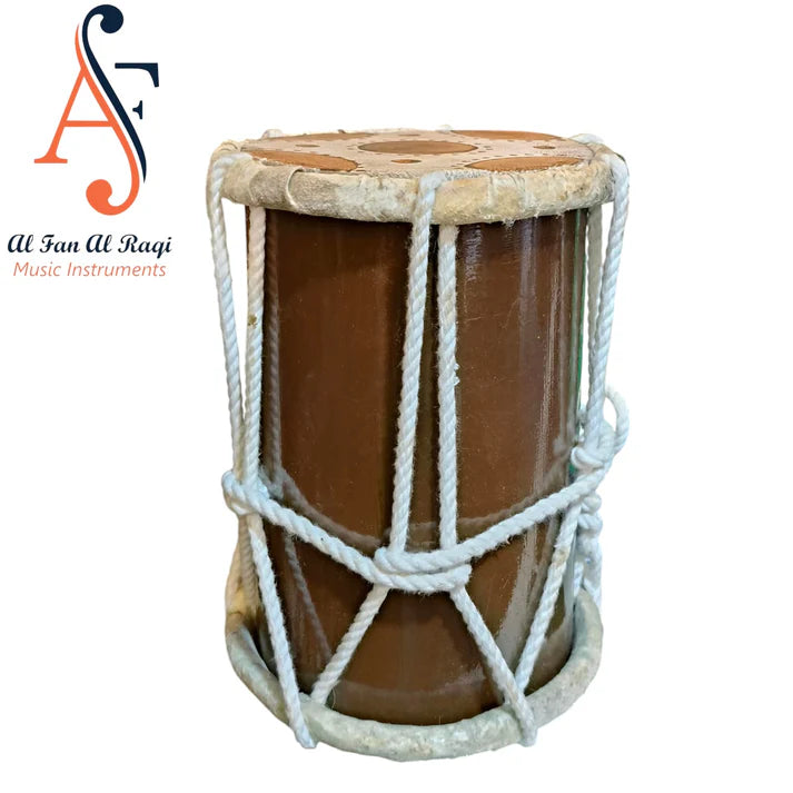 Traditional drum with rope wrapping on a white background, branded 'Al Fan Al Ragi Music Instruments'.