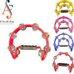 A collection of colorful handheld tambourines with metal jingles and ergonomic handles.