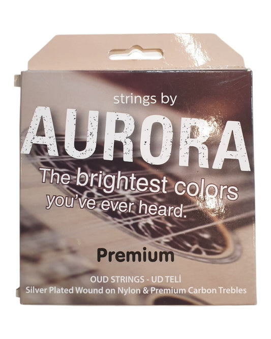 Box of Aurora guitar strings with a guitar image on a white background