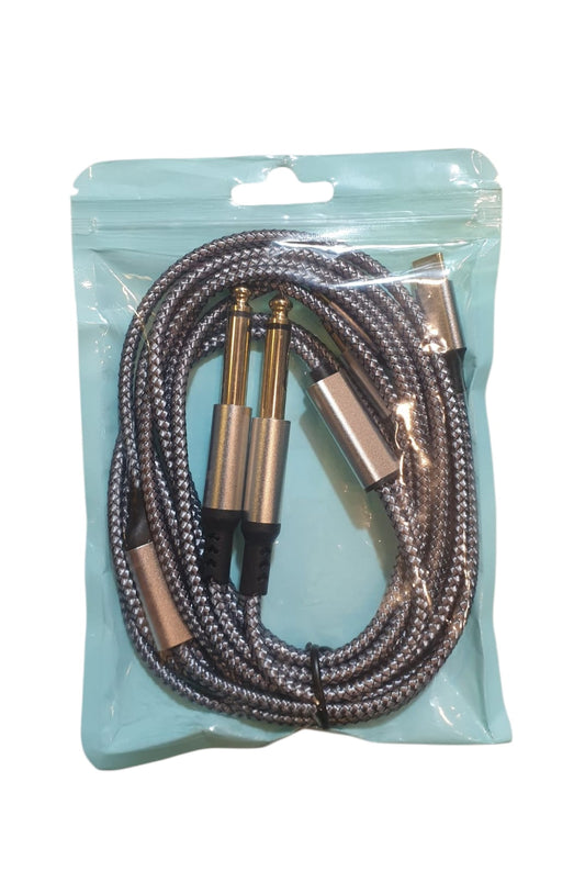 Braided audio cable with metal connectors in a clear plastic package on a light blue background