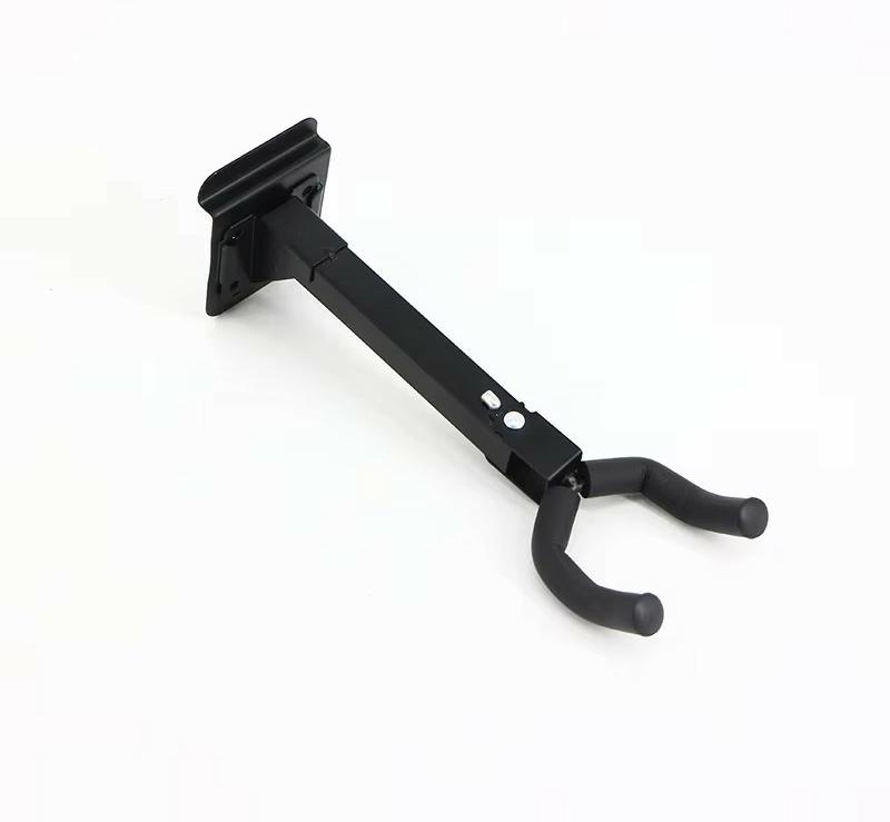 Black metal wall hook on a white background