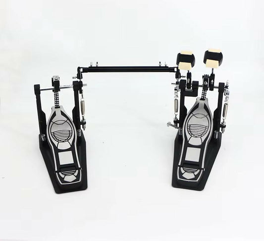 Pair of drum pedals on a white background