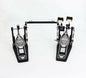 Pair of drum pedals on a white background