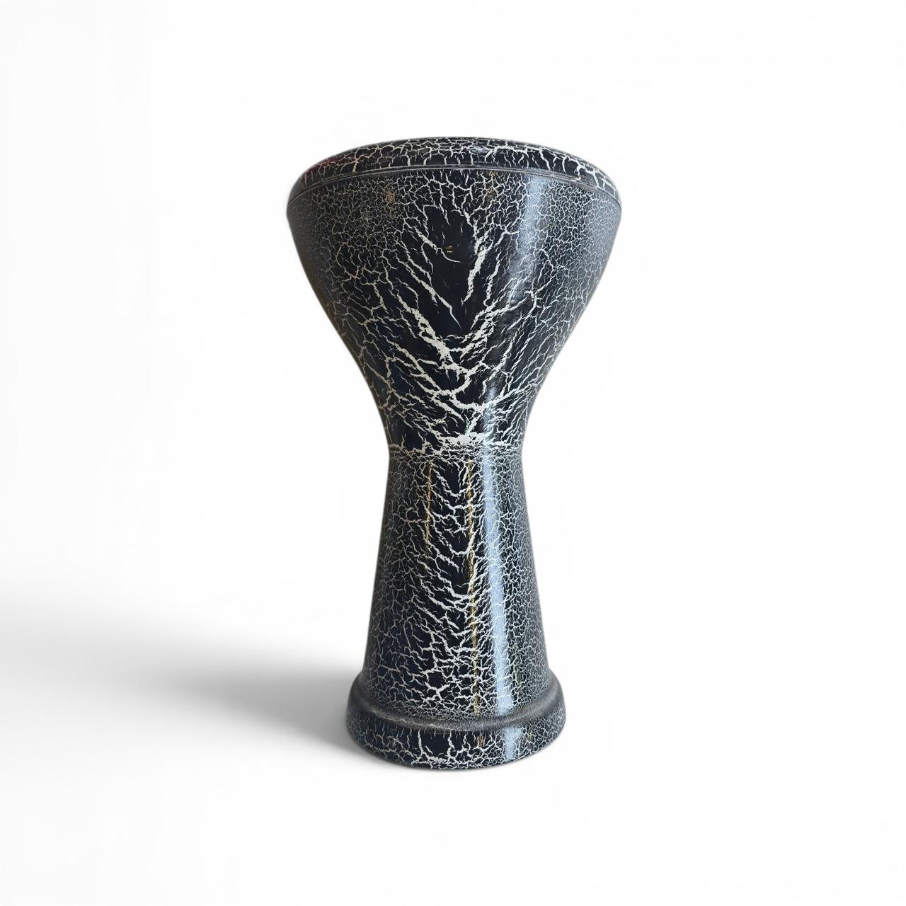 Decorative vase with a cracked texture on a white background