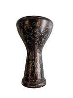 Decorative vase with intricate patterns on a white background