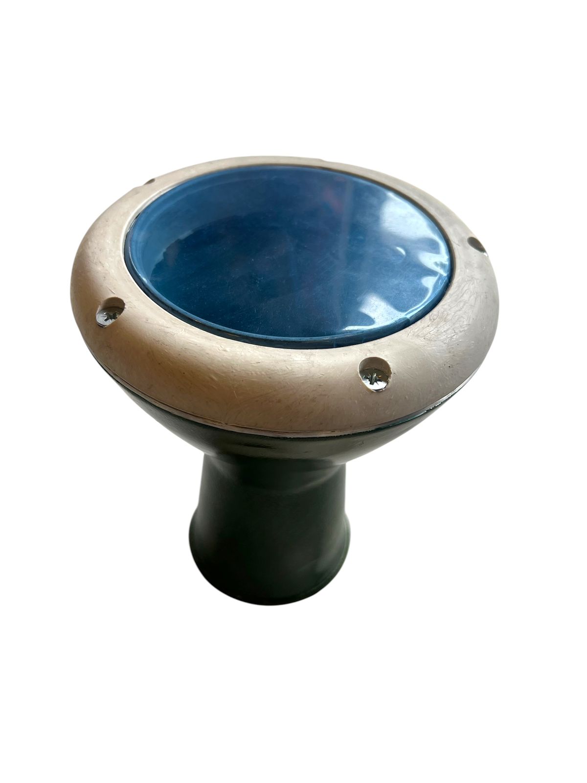 Round metal object with blue center on a white background