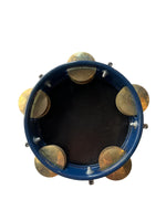 Tambourine with gold jingles on a white background