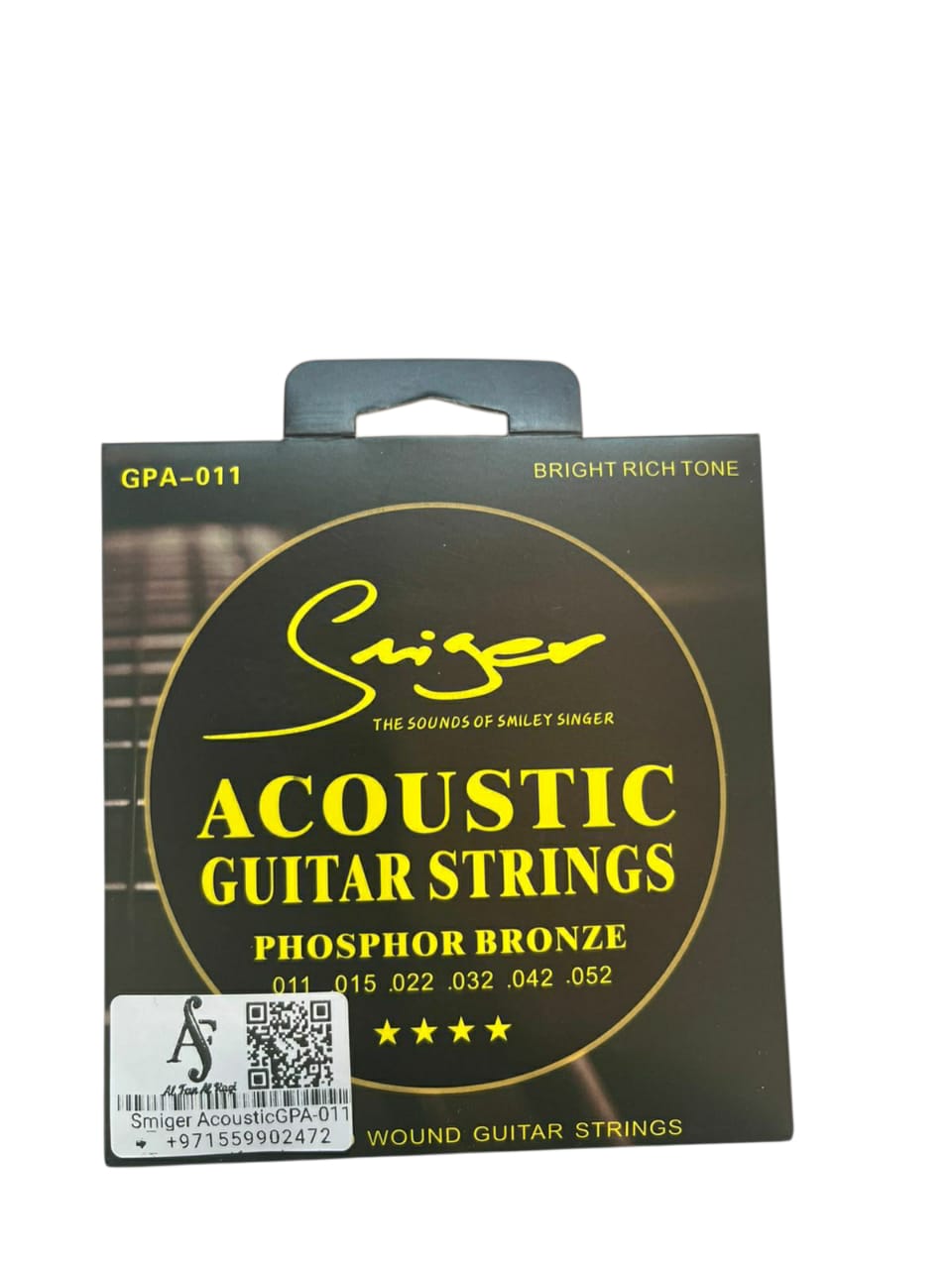 Pack of Suhr acoustic guitar strings on a white background