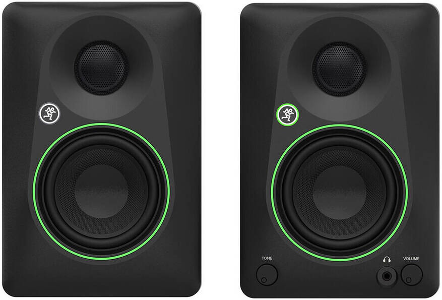 Pair of Mackie speakers with visible brand logo on a gray background