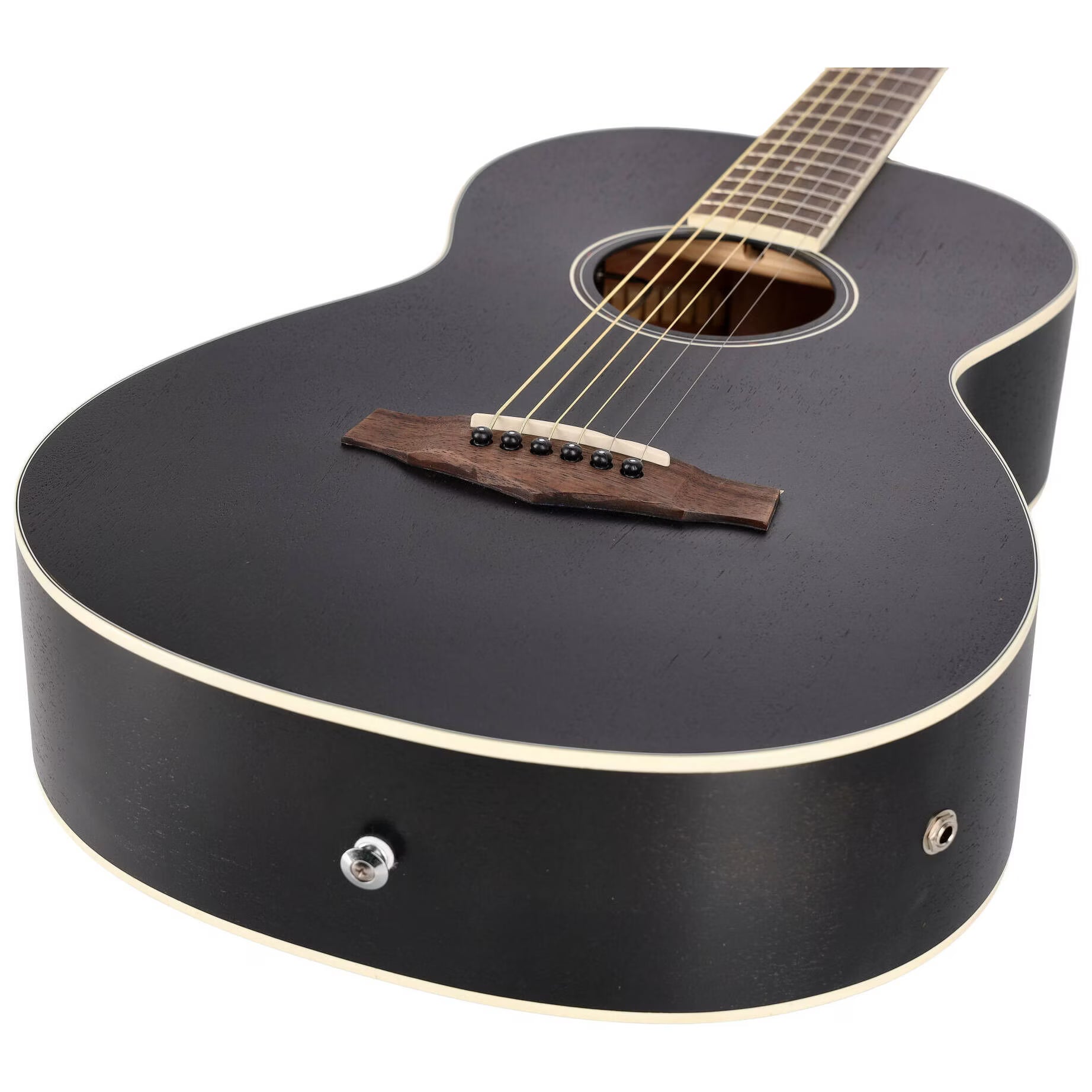 Black acoustic guitar with a white pickguard on a white background