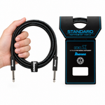 Ibanez SI5 black instrument cable held by an adult hand beside its original packaging
