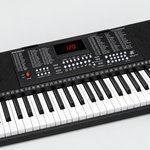 Close detail of the unbranded MK2117 electronic keyboard display, control panel, speakers, buttons, and upper keys
