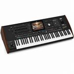 Korg Pa5X MG professional arranger keyboard, three-quarter angled view showing the keyboard depth and controls