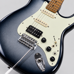 Close detail of the Smiger L-G2-i3 HFBF blue electric guitar HSS pickups, selector switch, control knobs, tremolo bridge, and output area