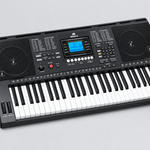 Close detail of the unbranded MK812 electronic keyboard LCD screen, control panel, speakers, buttons, and upper keys