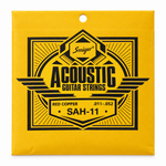 Close-up of the Smiger SAH-11 red copper acoustic guitar strings package showing the original .011-.052 gauge and package specifications