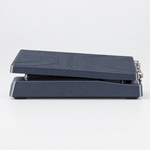 Side profile of the BOSS EV-30 dual expression pedal showing its compact low-profile treadle design.