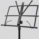 Close detail of the unbranded P-011 music stand tray, page retainers, angle adjustment knob, and center post
