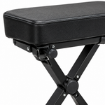 Close-up of the adjustable keyboard bench seat edge, locking knob, hinge, and X-frame hardware