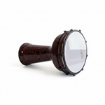 Unbranded Syrian Mukasir Star darbuka lying horizontally, showing the dark star-patterned body, drumhead, rim, and hardware on a clean white background