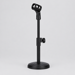 Unbranded ZM-02 mini microphone stand shown from a three-quarter angle with its microphone clip, adjustment knob, and desktop base