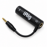 iRig guitar interface adapter, angled view showing the black adapter body, 3.5 mm plug, and audio jack