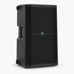 Three-quarter front view of the Mackie Thump215 powered loudspeaker showing its cabinet, grille, and side handle.