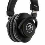 Close-up of a Mackie MC-100 earcup, cushioned pad, and headband connection.
