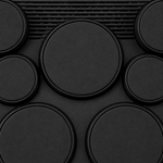 Close-up detail of the Yamaha DD-75's black drum-pad surfaces and raised rims.