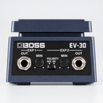 Close-up of the BOSS EV-30 polarity switch, range controls, and dual expression output jacks.