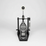 One Cymbal G610 black single drum pedal shown from the front with its pedal board, beater, spring, frame, and hardware