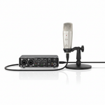 Behringer U-Phoria Studio PRO recording and podcasting bundle shown with UMC202HD interface, C-1 condenser microphone, desktop stand, and visible cable on a white background