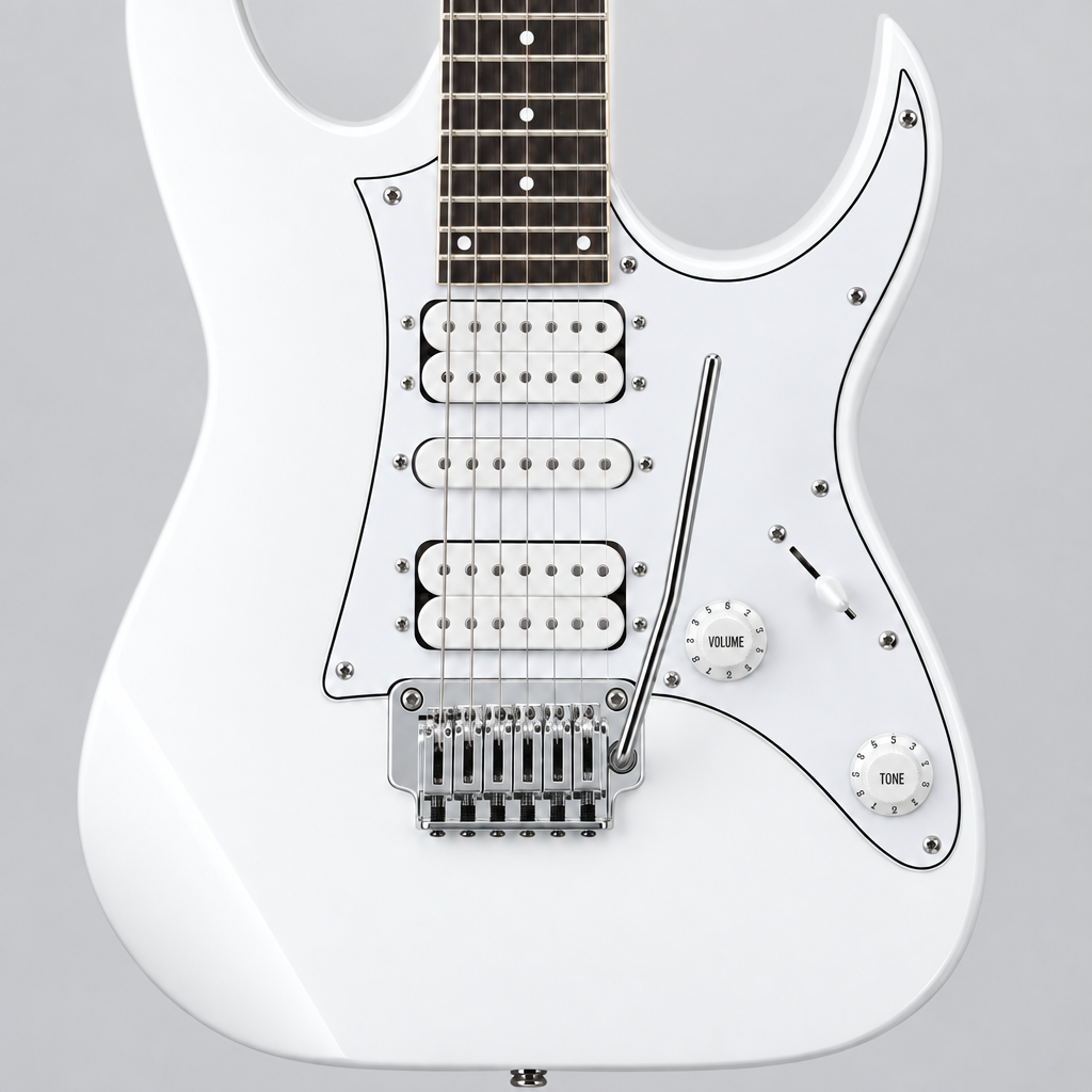 Close-up of the Ibanez GRG140-WH white electric guitar pickups, bridge, strings, and controls against a light gray background.