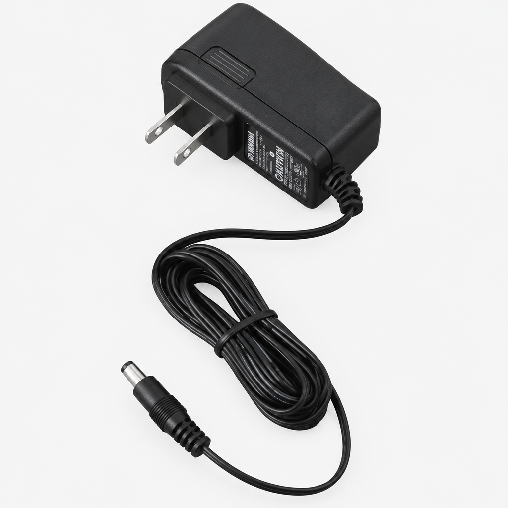 Full view of the Yamaha PA-130 AC power adapter with attached cable and connector.